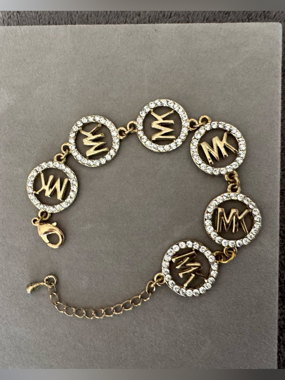 Michael Kors Gold Tone MK Logo Rhinestone Bracelet